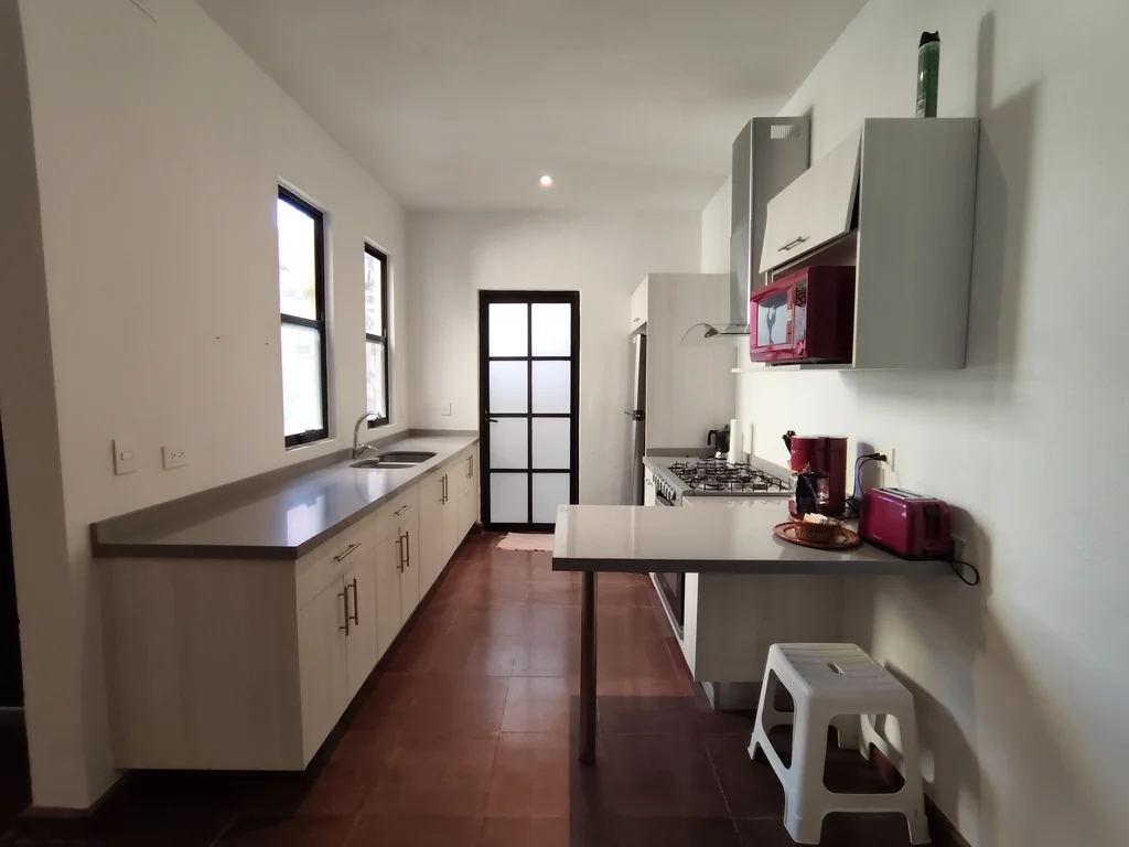 Equipped kitchen with oven and stove